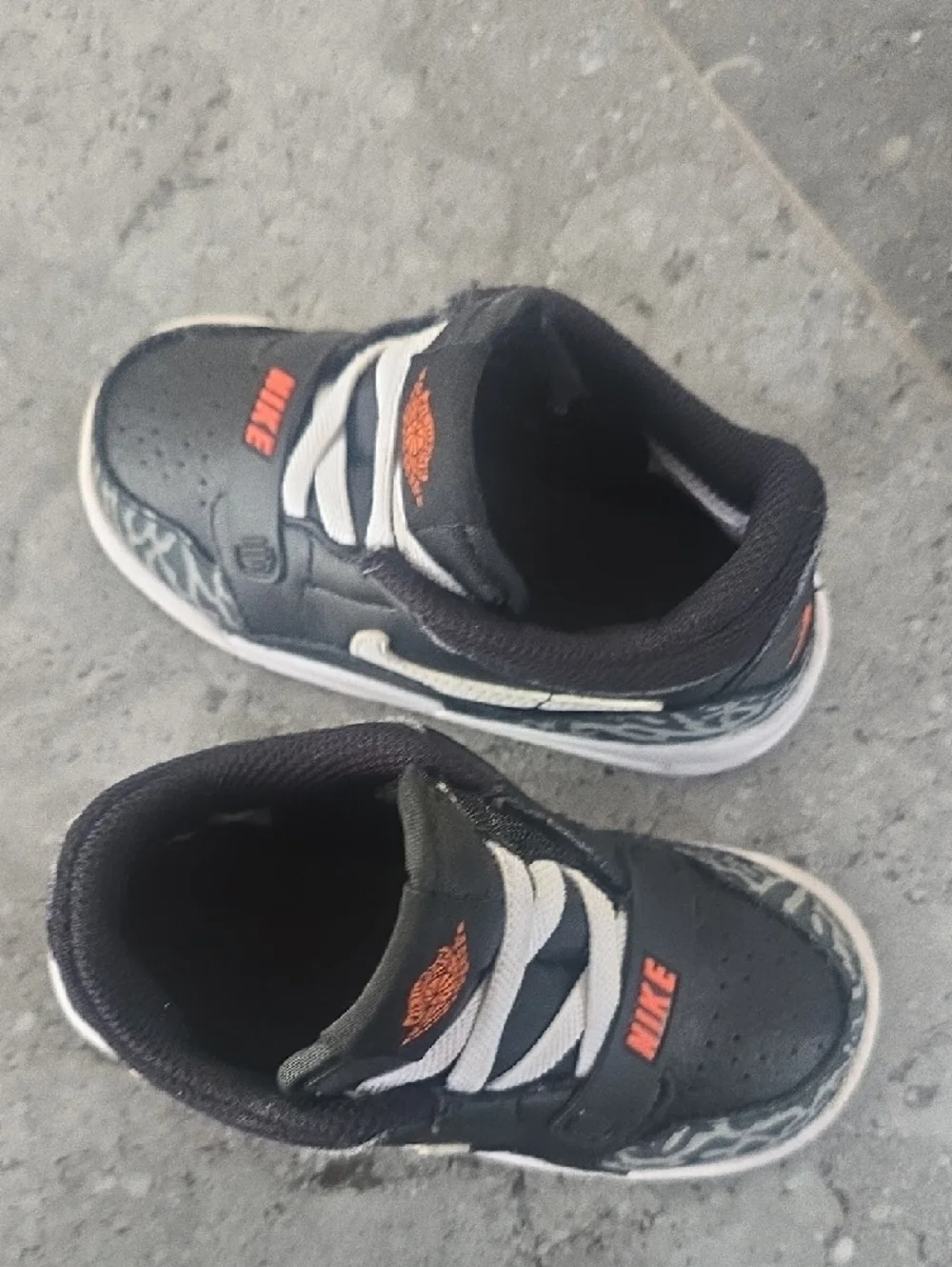 Nike Kids Black Sneakers with White Laces and Orange Logos - Picture 3 of 10